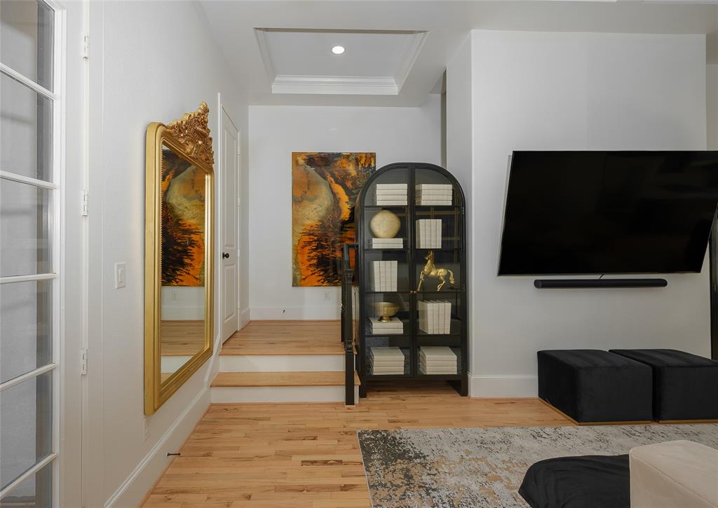 727 Will Rice Avenue Irving, TX 75039 - Photo 12 of 26 a living room with furniture and a flat screen tv