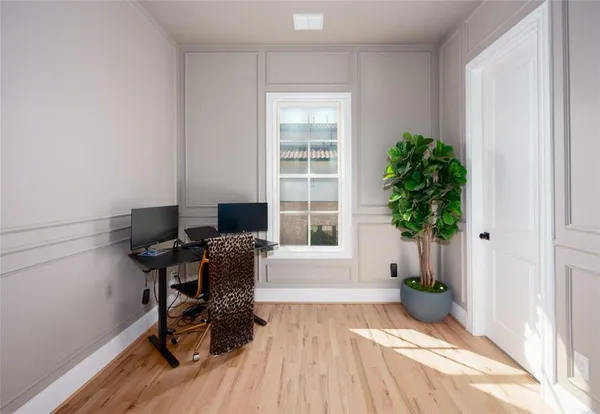 a workspace with furniture and a window