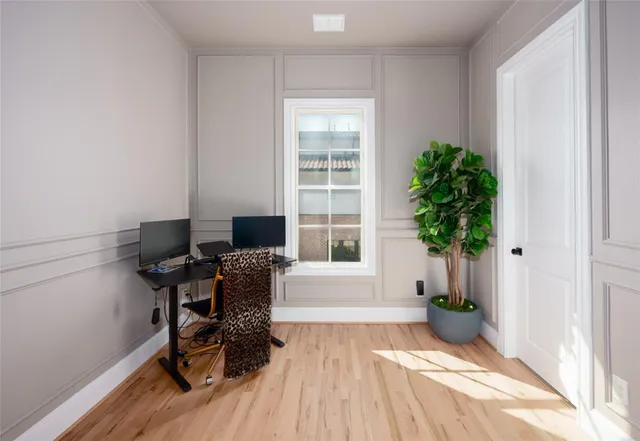 a workspace with furniture and a window