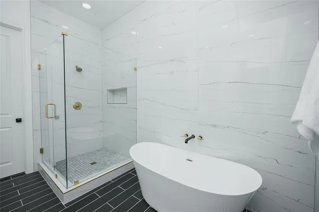 a bathroom with a sink and shower