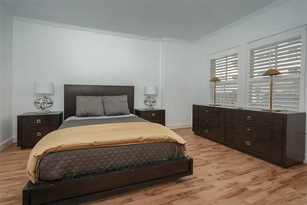 a bedroom with a bed and a closet