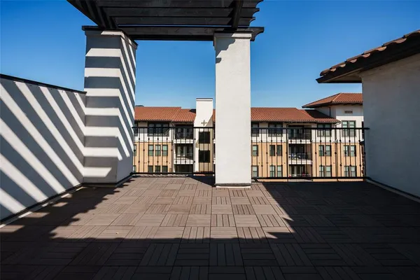 a view of backyard with a large window