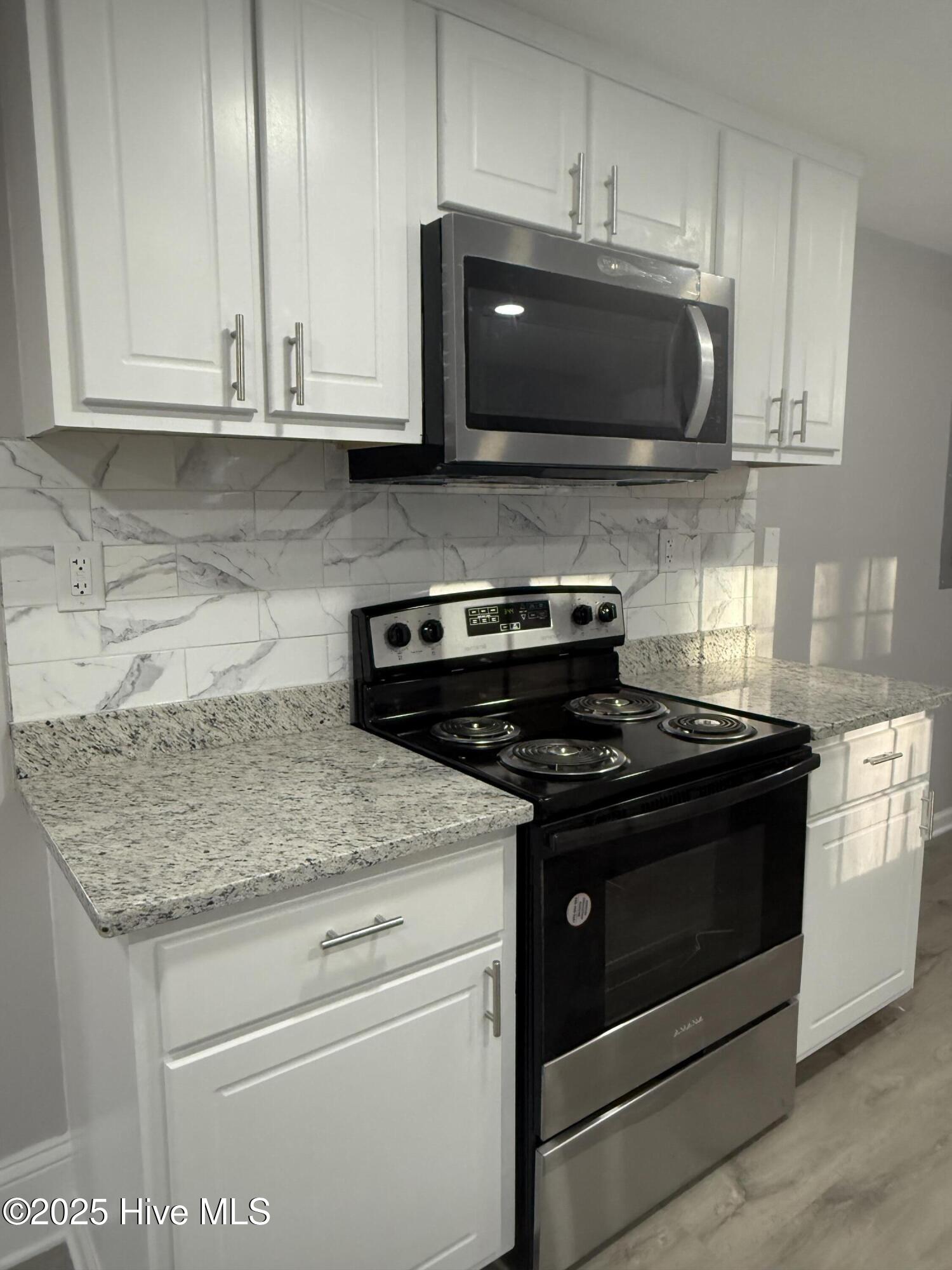 1277 Mt Tabor Road Creswell, NC 27928 - Photo 13 of 35 New Microwave and Stove