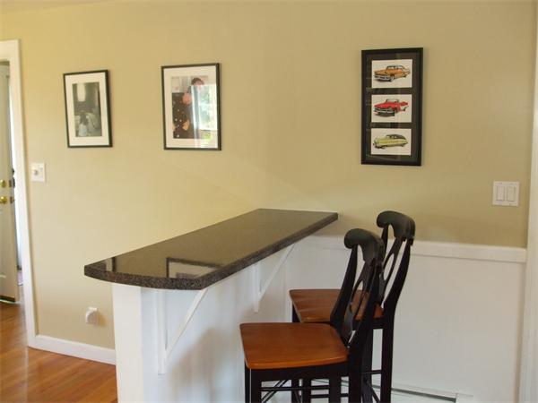 34 Hereford Road Marblehead, MA 01945 - Photo 5 of 9 a view of a dining room with furniture and wooden floor