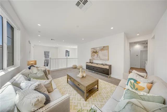 a living room with furniture and a couch