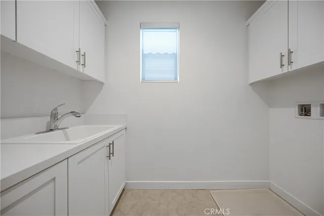 a bathroom with a sink and vanity