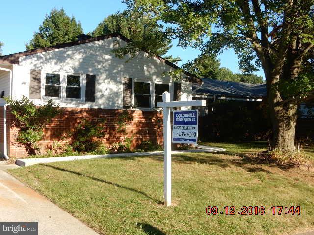 3907 Chaffey Road Randallstown, MD 21133 - Photo 1 of 17 a front view of a house with garden
