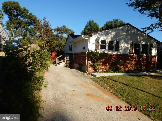 3907 Chaffey Road Randallstown, MD 21133 - Photo 2 of 17 a front view of house with yard