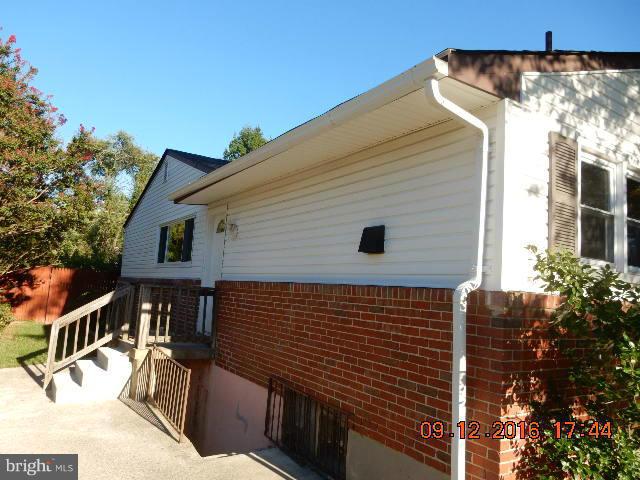 3907 Chaffey Road Randallstown, MD 21133 - Photo 3 of 17 a view of a house with a patio