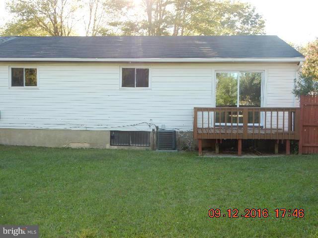 3907 Chaffey Road Randallstown, MD 21133 - Photo 5 of 17 a view of front of house with a yard