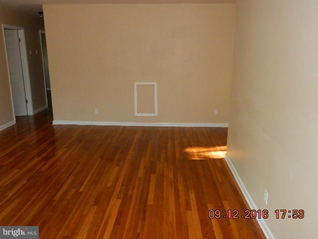 3907 Chaffey Road Randallstown, MD 21133 - Photo 6 of 17 a view of wooden floor