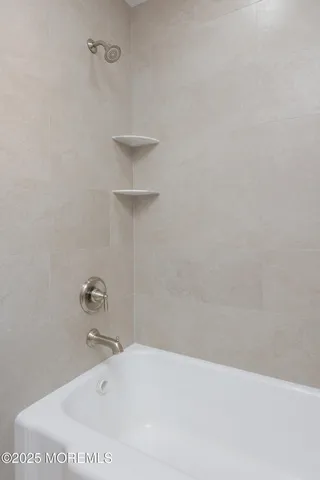 a bathroom with a sink a toilet and window