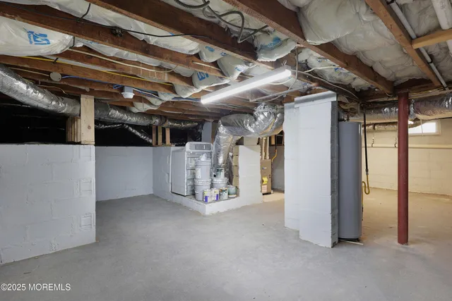 a view of empty room with wooden walls