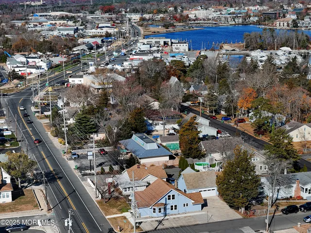 an aerial view of house with wooden stairs