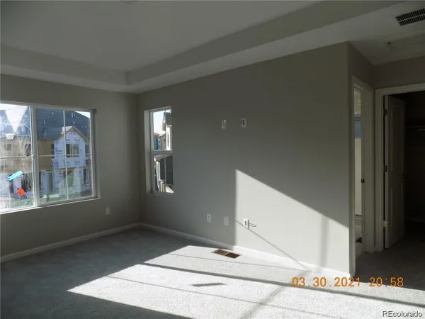 a view of an empty room and window