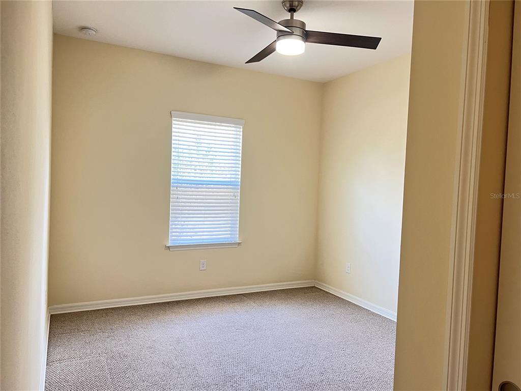 5753 Hydrangea Circle Sarasota, FL 34238 - Photo 18 of 31 a view of an empty room with a window