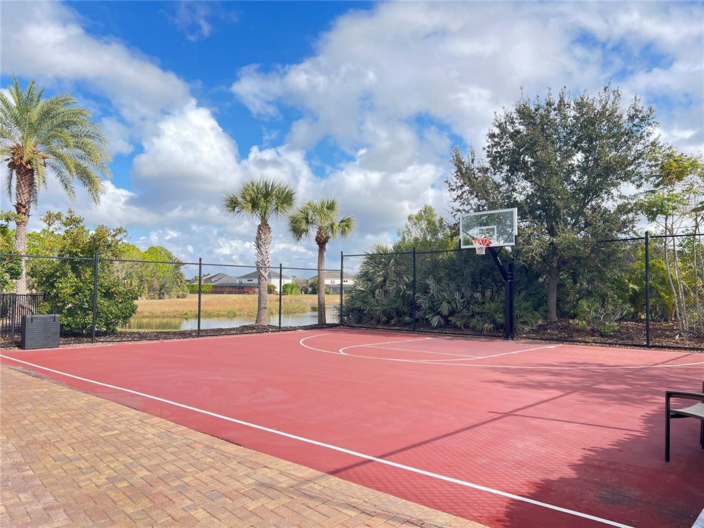 5753 Hydrangea Circle Sarasota, FL 34238 - Photo 30 of 31 a view of a tennis court