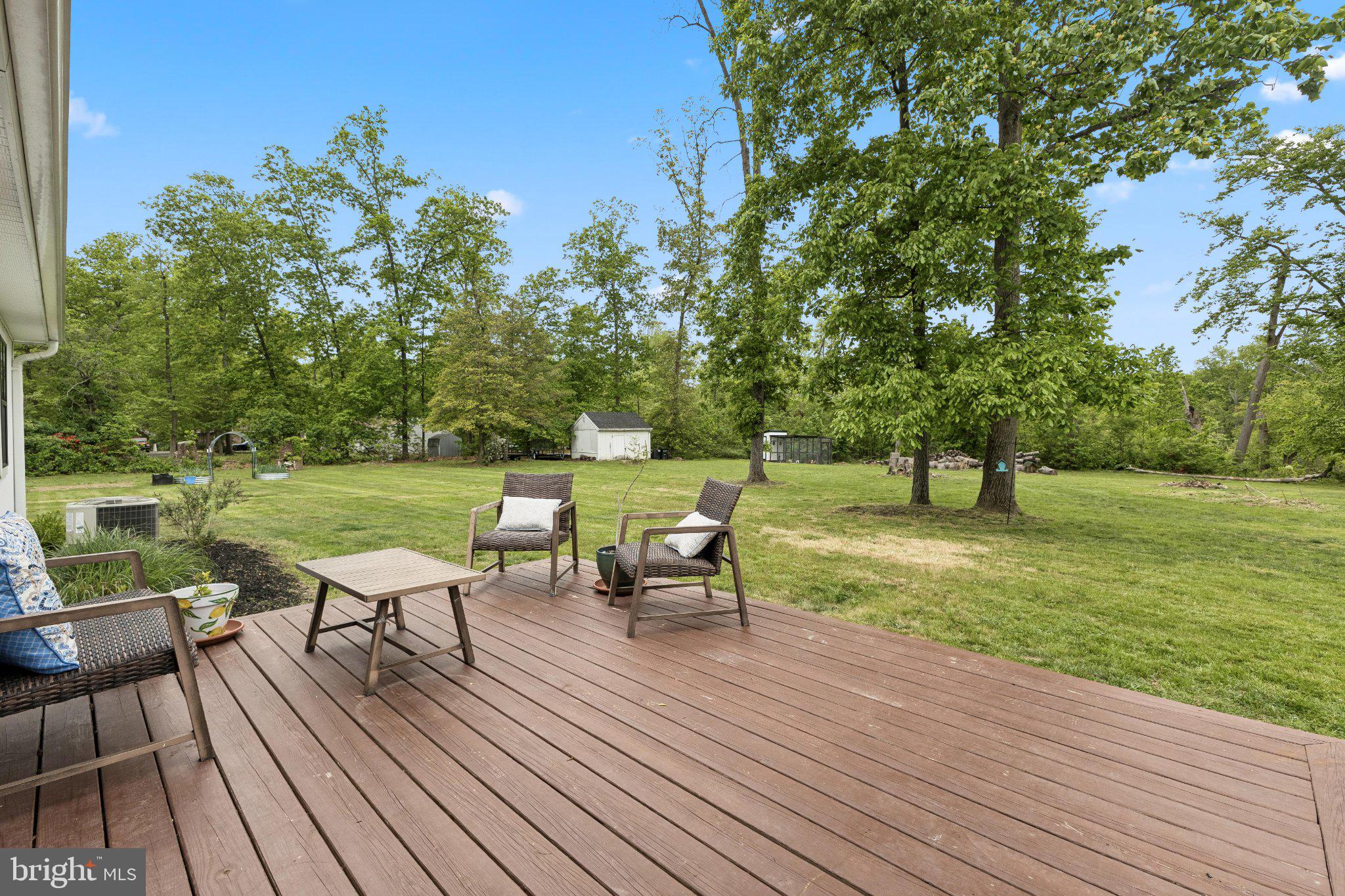 9816 Fairlee Road Chestertown, MD 21620 - Photo 10 of 48 Deck overlooking lush greenery.