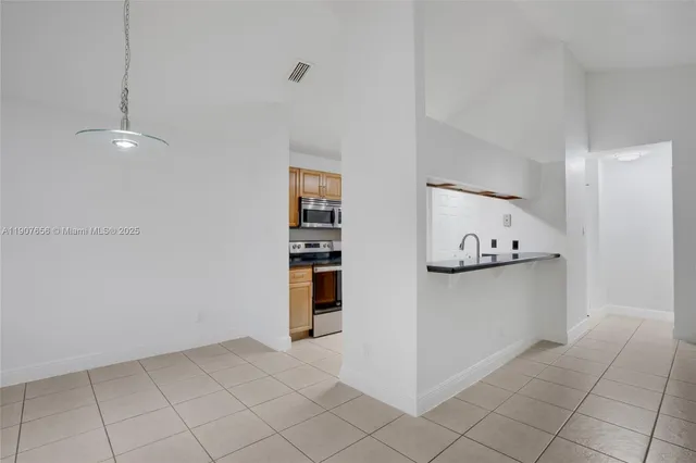 a view of kitchen and window