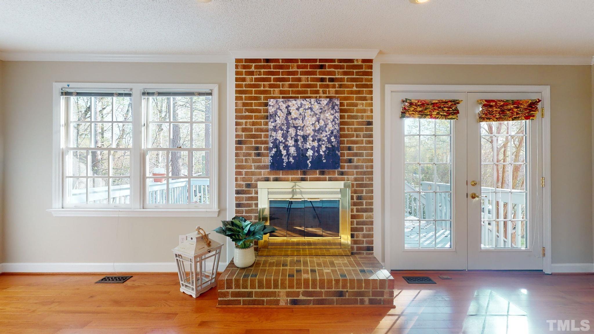 213 Silvercliff Trail Cary, NC 27513 - Photo 25 of 31 a living room with furniture and a window