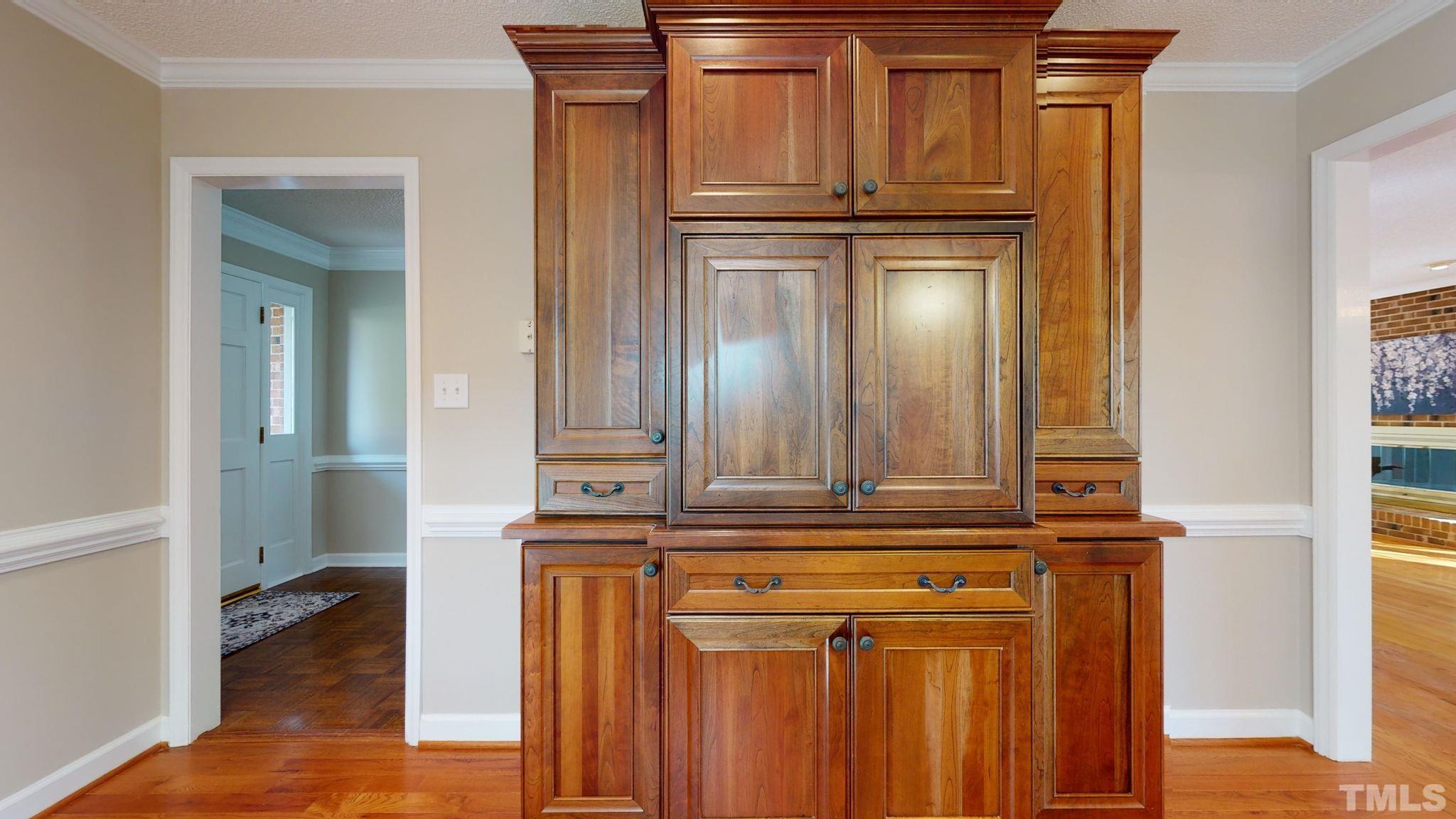 213 Silvercliff Trail Cary, NC 27513 - Photo 29 of 31 a view of a closet with wooden floor