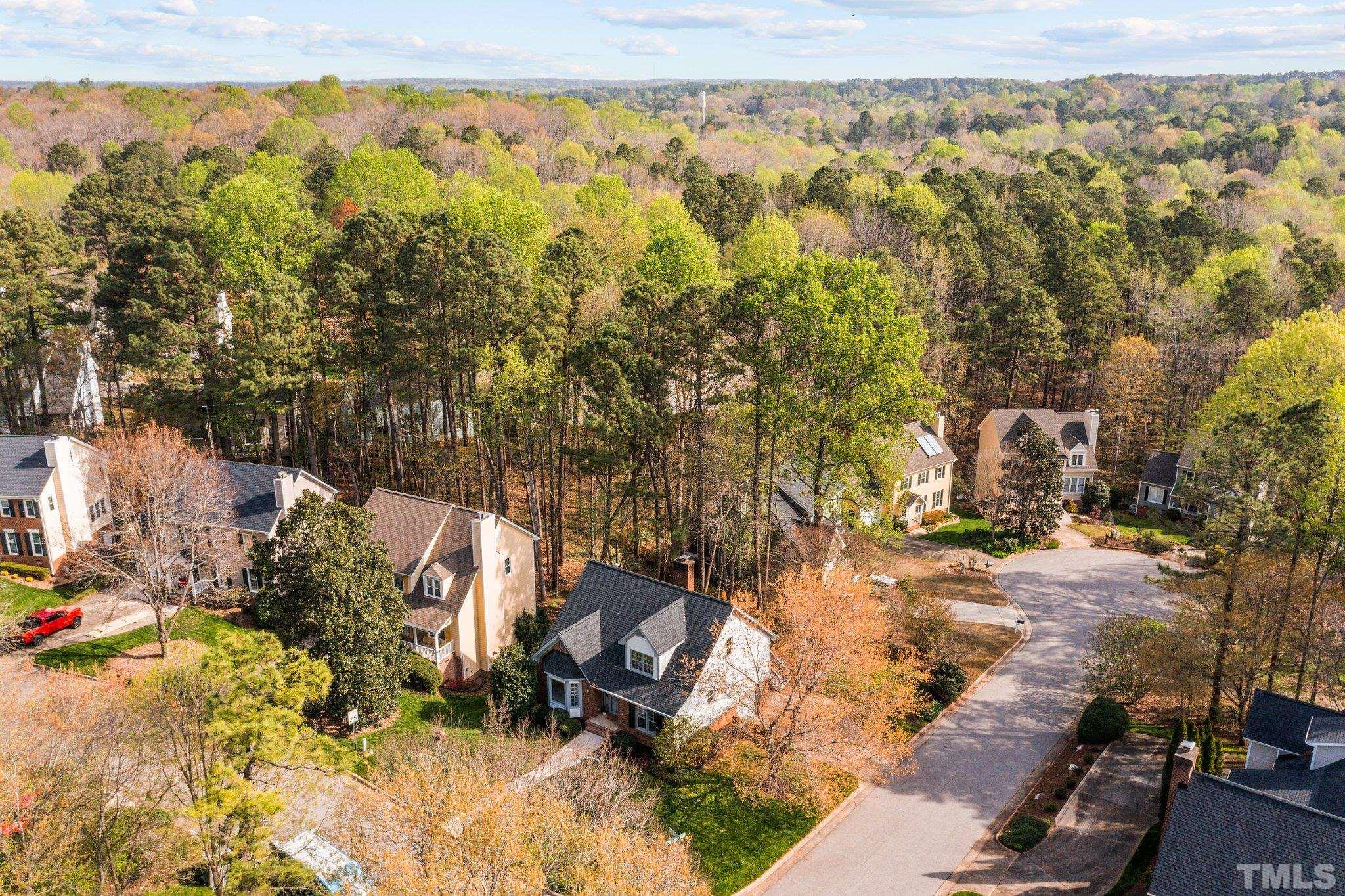 213 Silvercliff Trail Cary, NC 27513 - Photo 3 of 31 a view of a yard with wooden fence