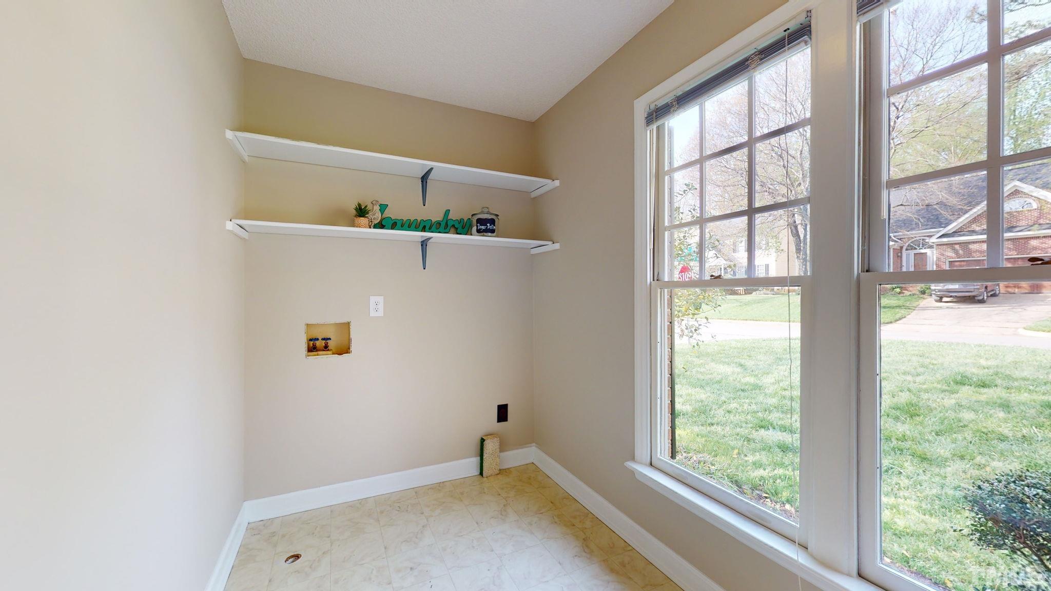 213 Silvercliff Trail Cary, NC 27513 - Photo 10 of 31 a room with a window