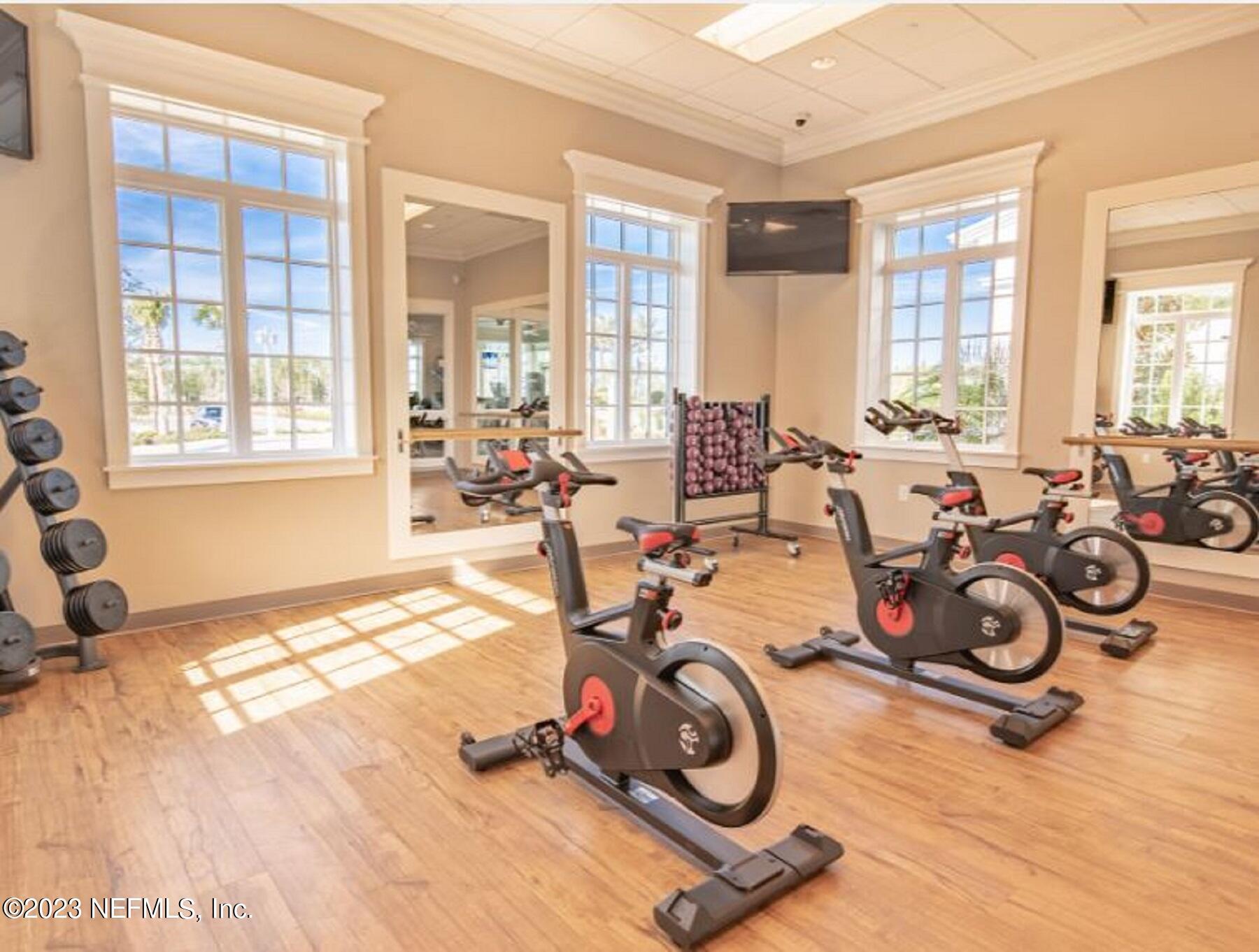 346 Whirlwind Place, Unit 186 St. Augustine, FL 32095 - Photo 13 of 13 a view of a room with gym equipment
