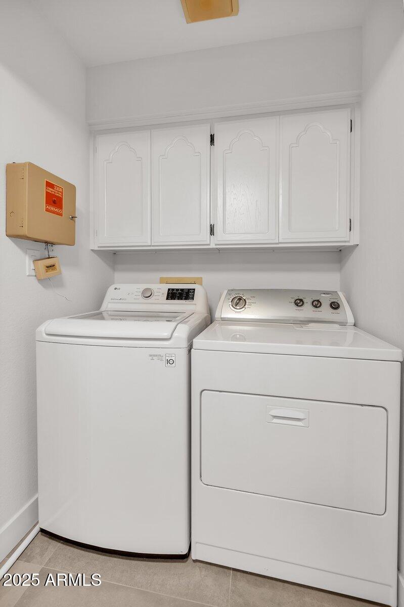 7614 East Gila Bend Road Scottsdale, AZ 85258 - Photo 24 of 36 a utility room with dryer and washer