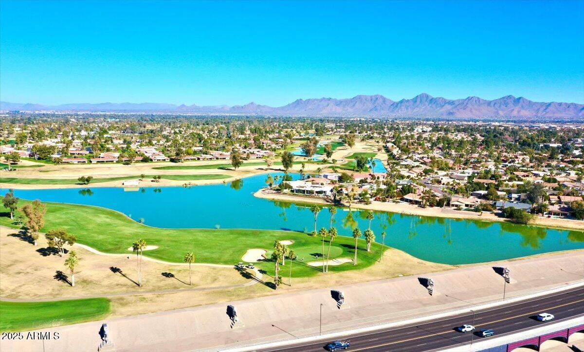 7614 East Gila Bend Road Scottsdale, AZ 85258 - Photo 33 of 36 a view of a city with an ocean beach