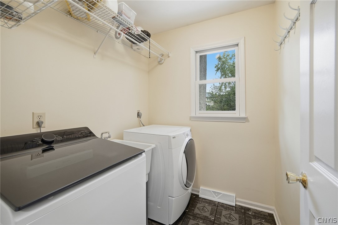 4084 Cortina Road Lysander, NY 13027 - Photo 23 of 48 Spacious laundry with new washer/dryer.