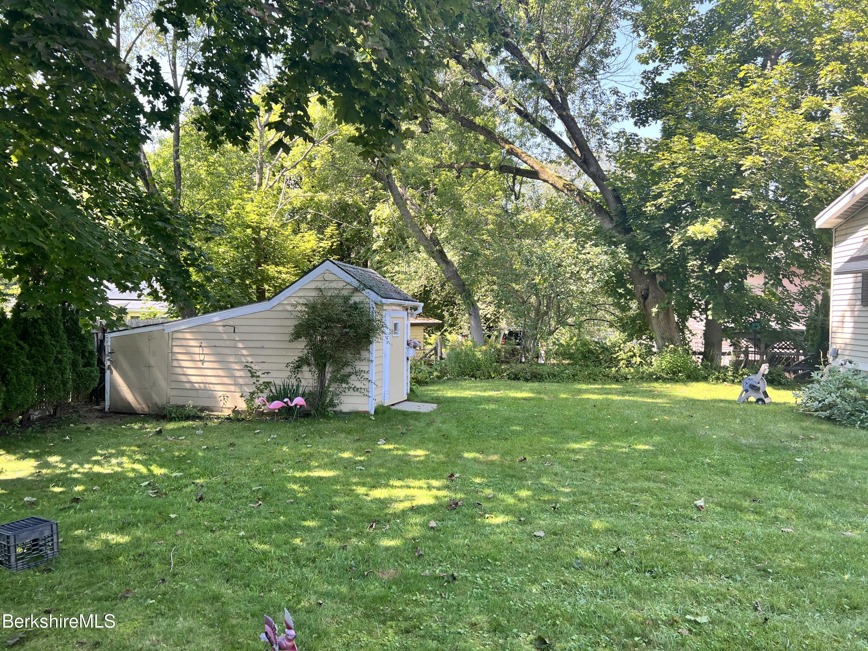 405 Pittsfield Road, Unit H12 Lenox, MA 01240 - Photo 12 of 13 a view of a house with backyard