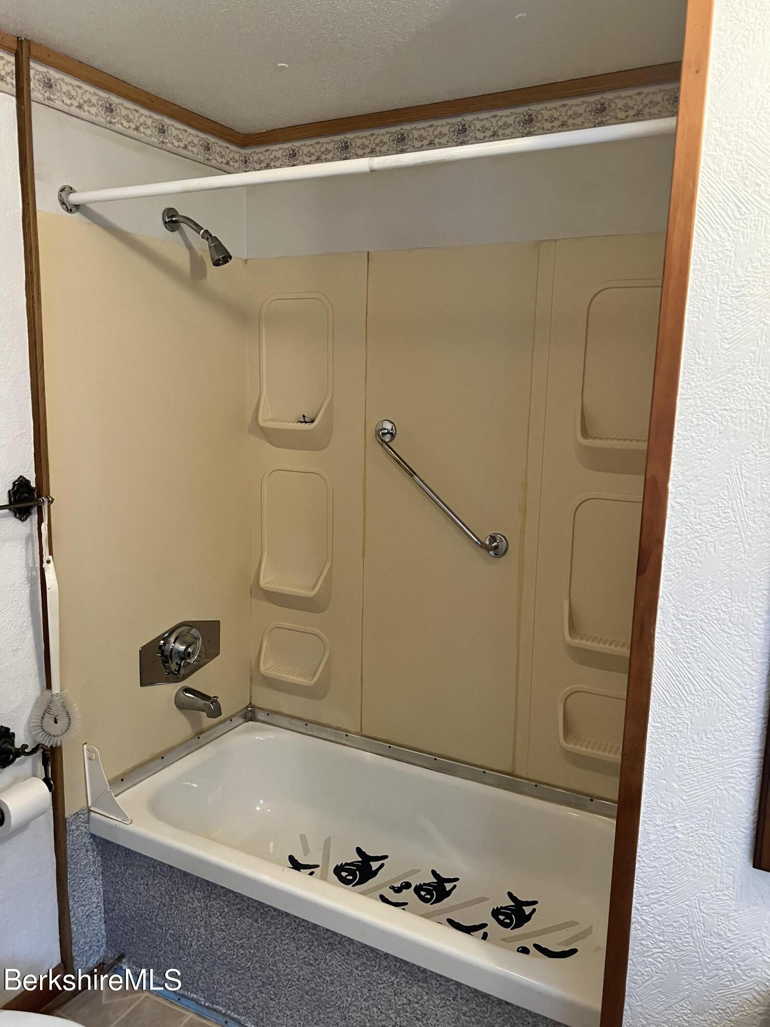 405 Pittsfield Road, Unit H12 Lenox, MA 01240 - Photo 8 of 13 a bathroom with a tub and a shower