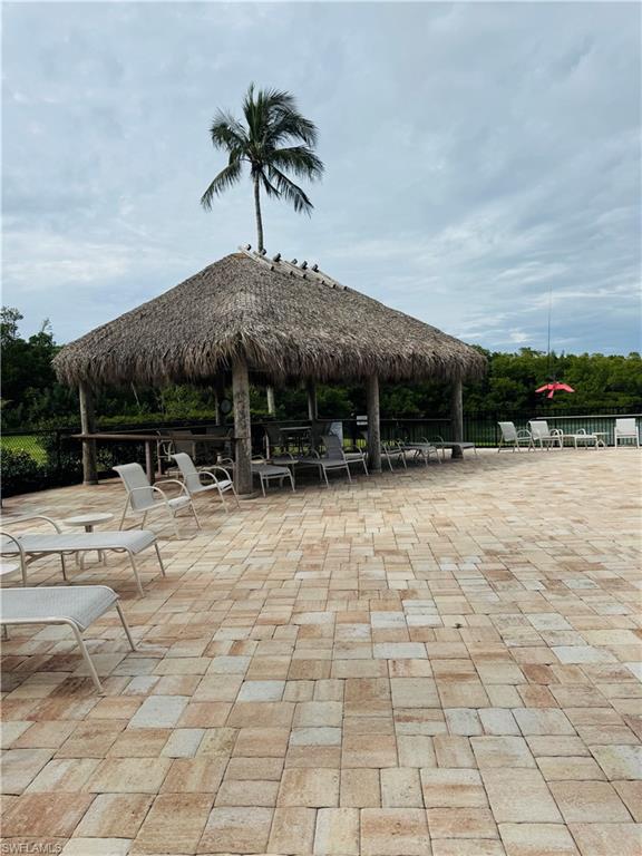 15 Bluebill Avenue, Unit 1006 Naples, FL 34108 - Photo 5 of 25 View of home's community with a patio area
