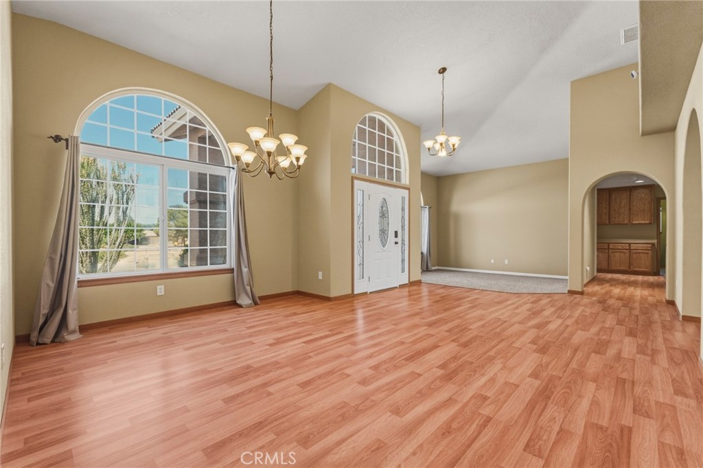 19501 Kinai Road Apple Valley, CA 92307 - Photo 8 of 49 a view of a room with window wooden floor and windows