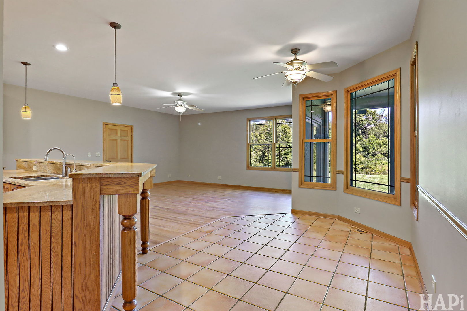 9014 Glacier Ridge Richmond, IL 60071 - Photo 13 of 48 a view of a kitchen with a sink cabinets and window