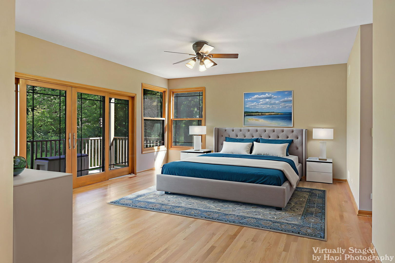 9014 Glacier Ridge Richmond, IL 60071 - Photo 24 of 48 a spacious bedroom with a large bed and a chandelier