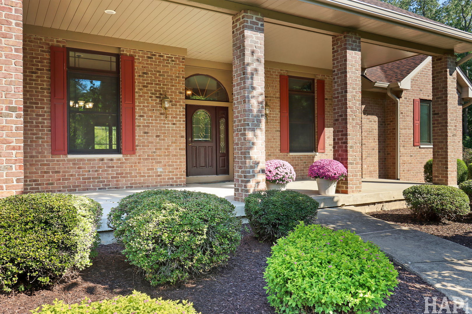 9014 Glacier Ridge Richmond, IL 60071 - Photo 4 of 48 a front view of a house with garden