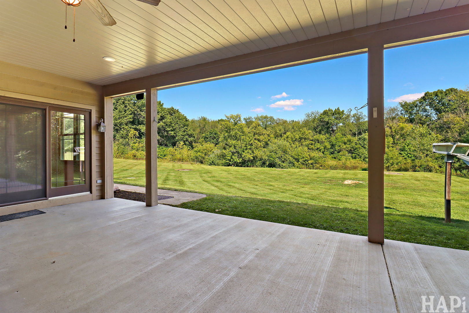 9014 Glacier Ridge Richmond, IL 60071 - Photo 43 of 48 a view of a room with floor to ceiling windows and yard