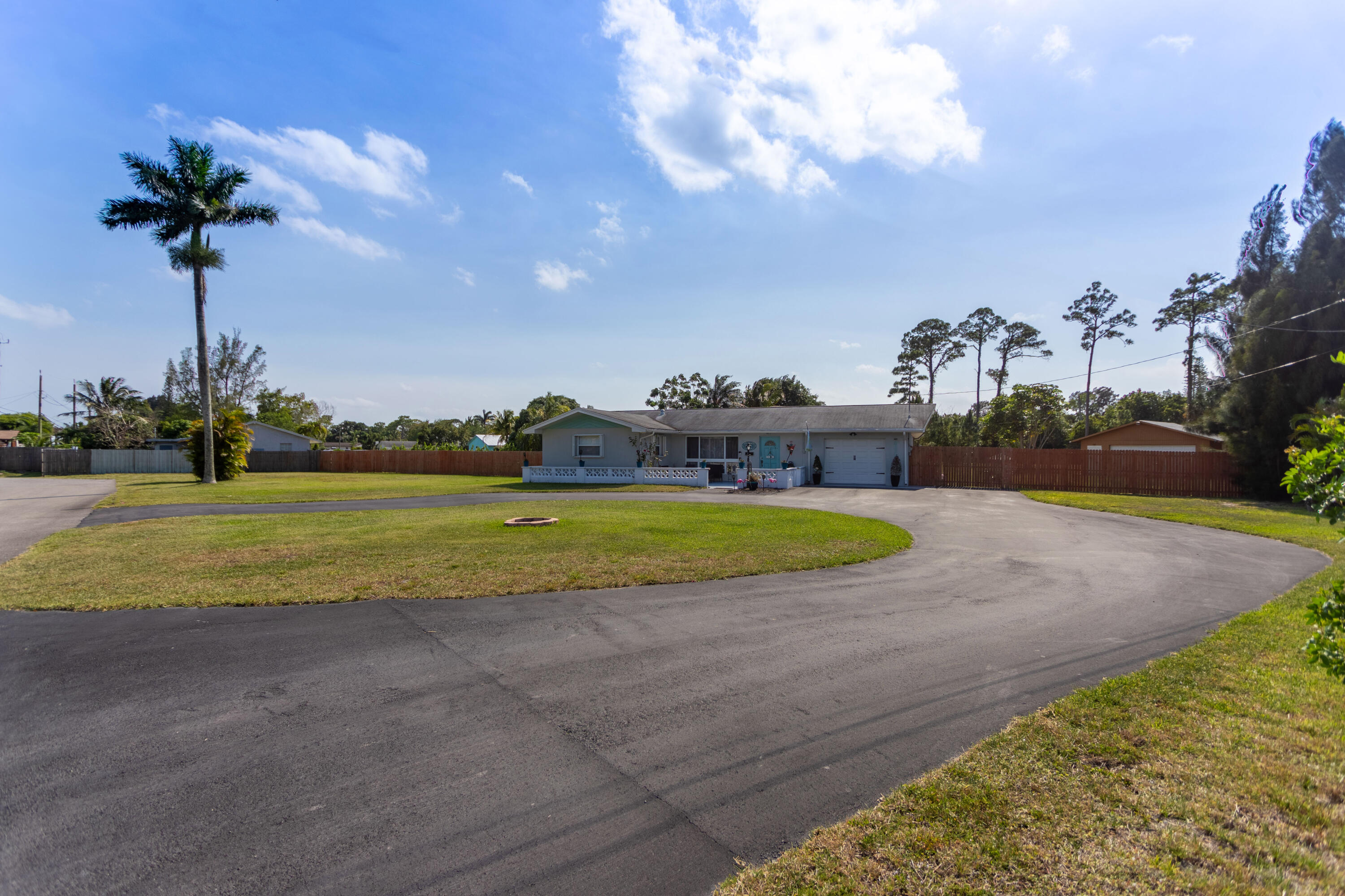 4237 Herbertz Road Lake Worth, FL 33461 - Photo 1 of 43 Driveway