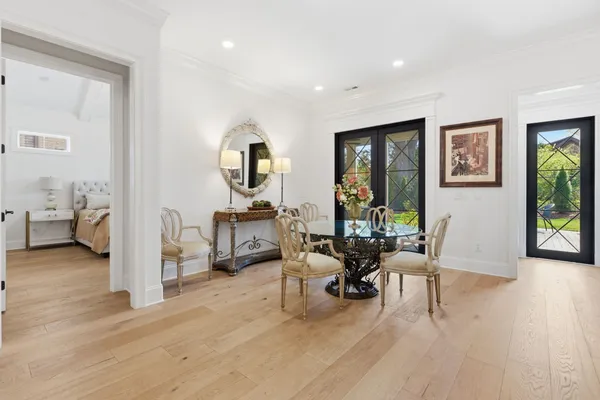 a view of a livingroom with furniture and a workspace
