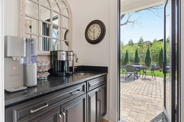 a very nice looking kitchen with a large window