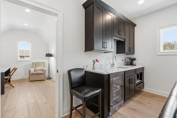 a spacious bathroom with a sink double vanity and a mirror
