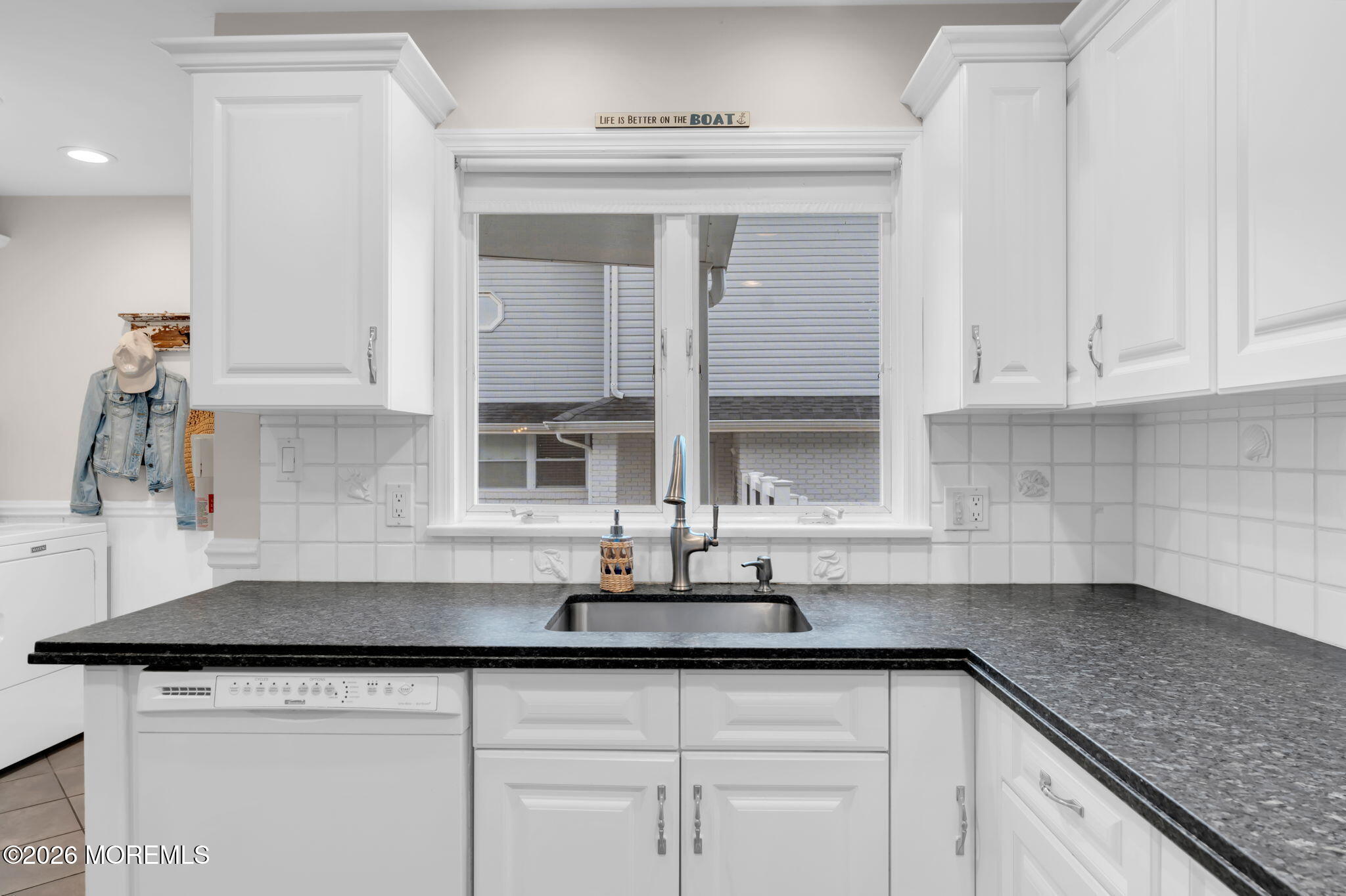 29 Green Island Road Toms River, NJ 08753 - Photo 20 of 63 a kitchen with stainless steel appliances granite countertop a sink and white cabinets
