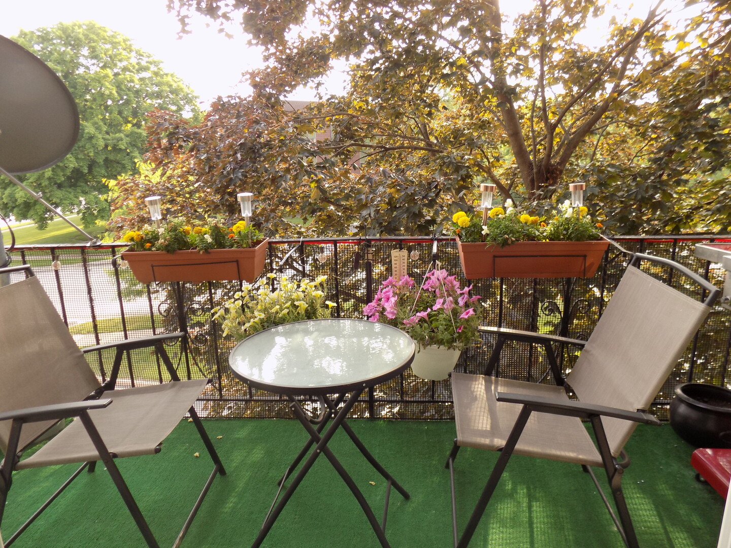 1025 South Fernandez Avenue, Unit 3M Arlington Heights, IL 60005 - Photo 17 of 20 a view of a chairs and table in patio