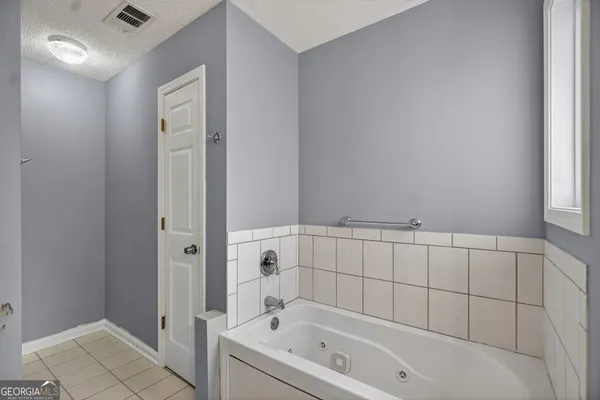 a bathroom with a bathtub