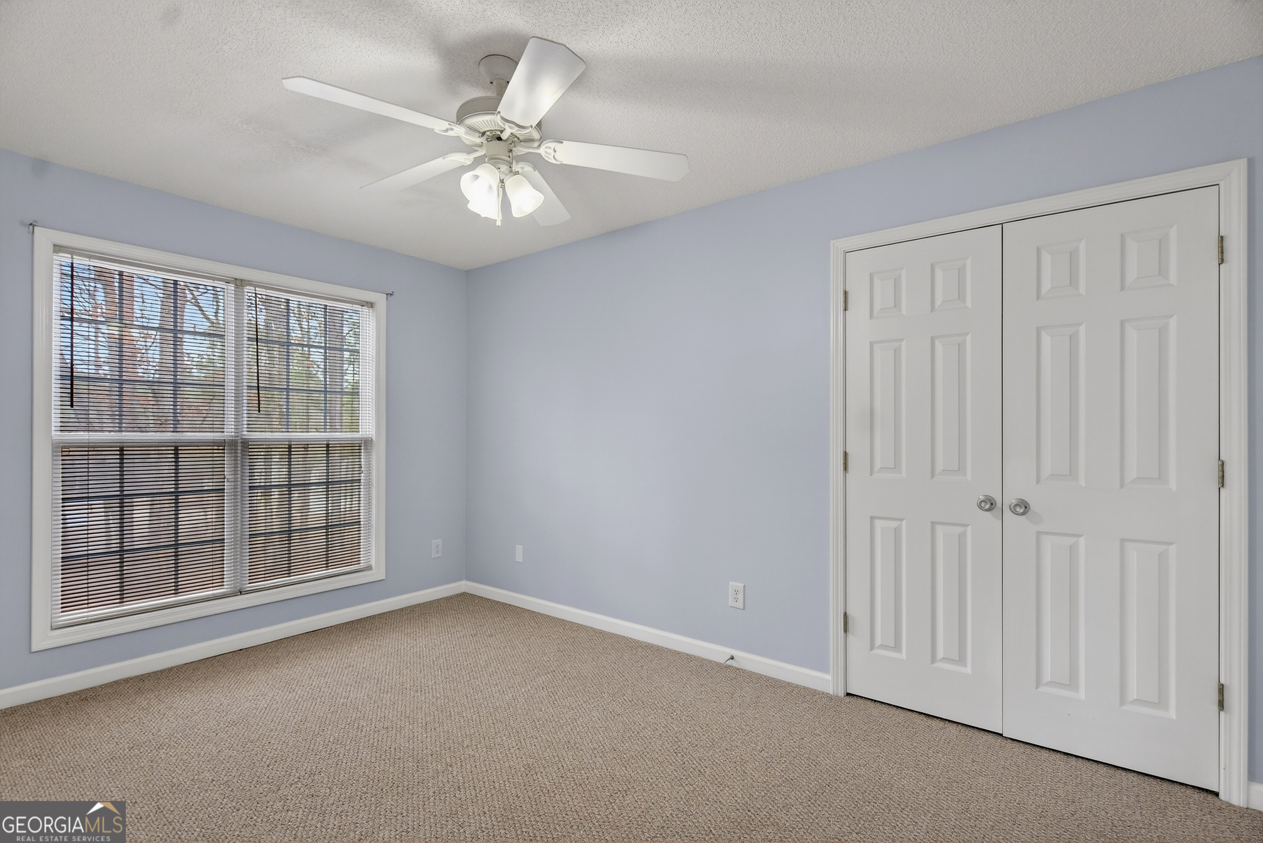 107 Waters Edge Drive LaGrange, GA 30240 - Photo 20 of 29 wooden floor in an empty room with a window
