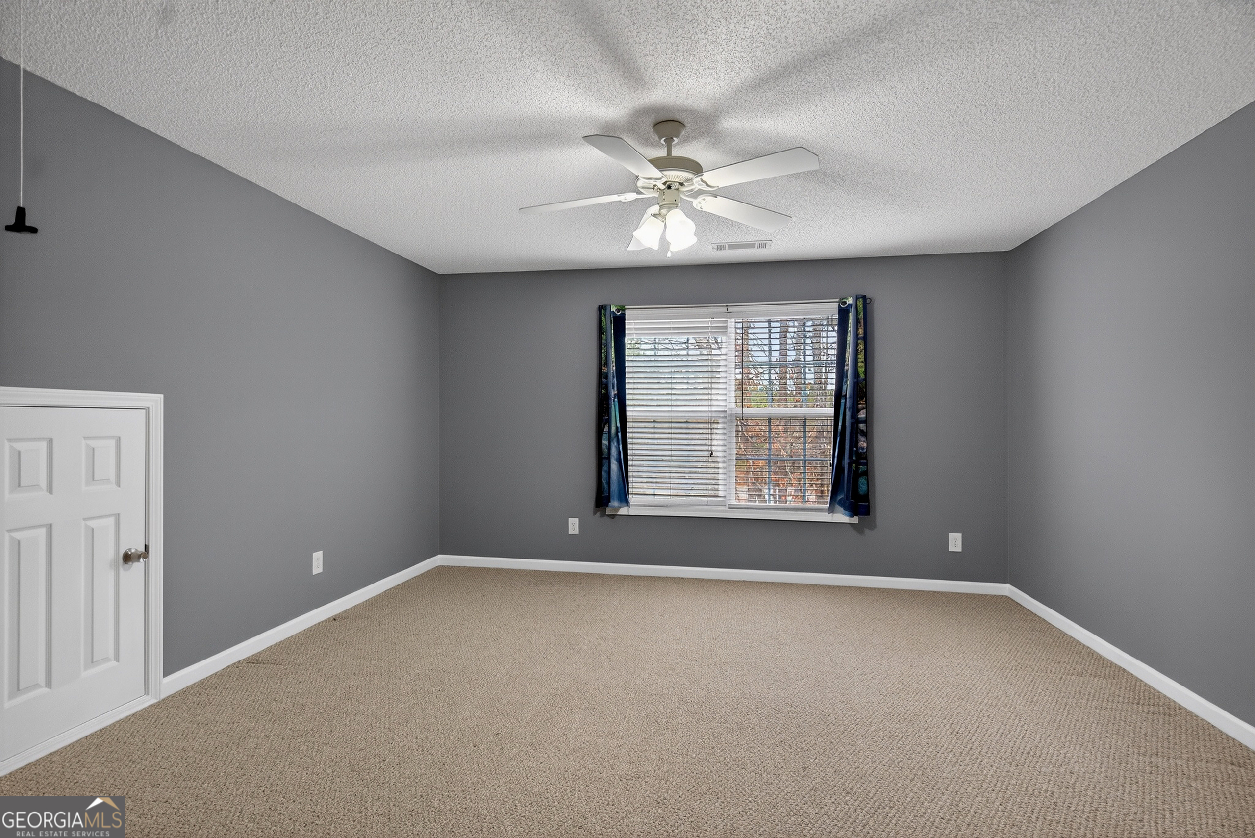 107 Waters Edge Drive LaGrange, GA 30240 - Photo 21 of 29 a view of an empty room with a window