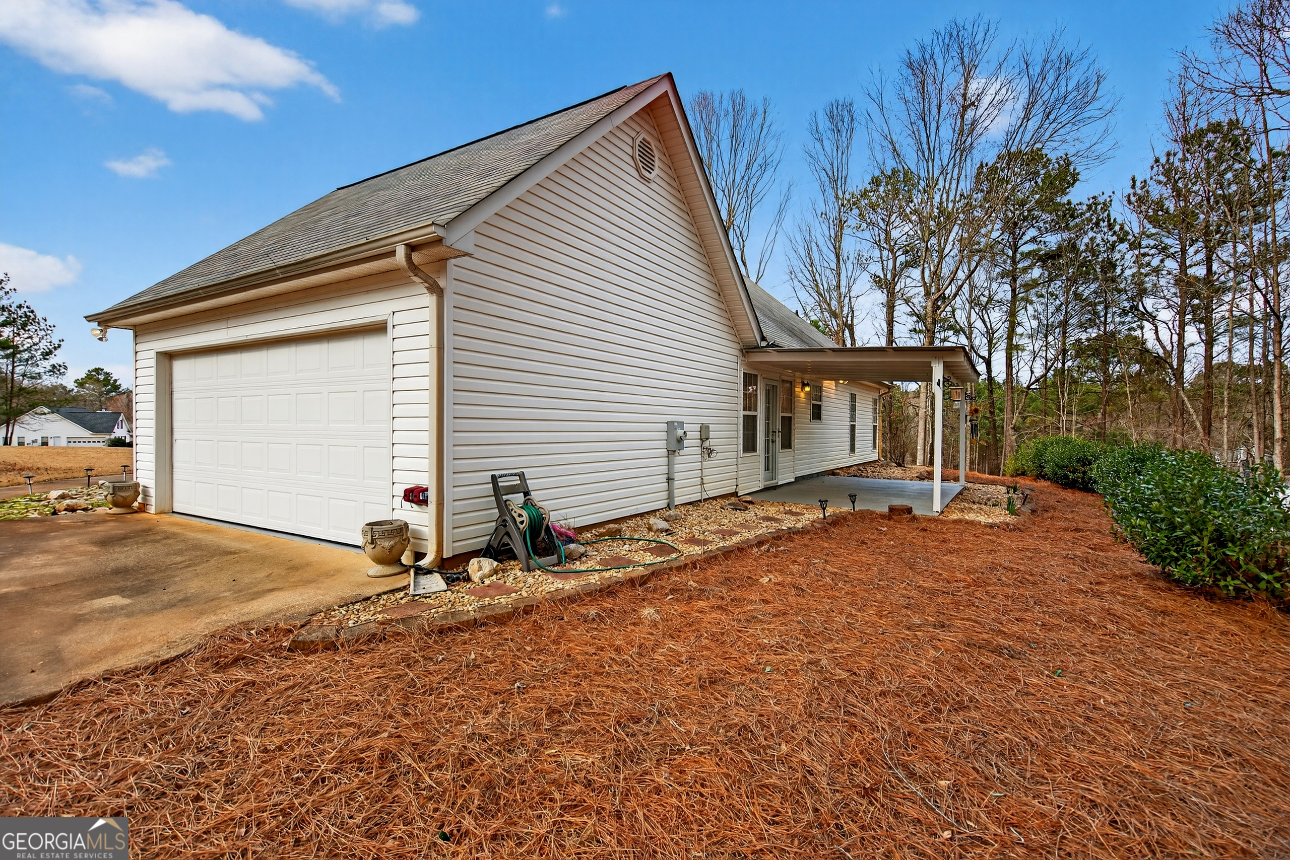 107 Waters Edge Drive LaGrange, GA 30240 - Photo 25 of 29 a view of a house with backyard and trees