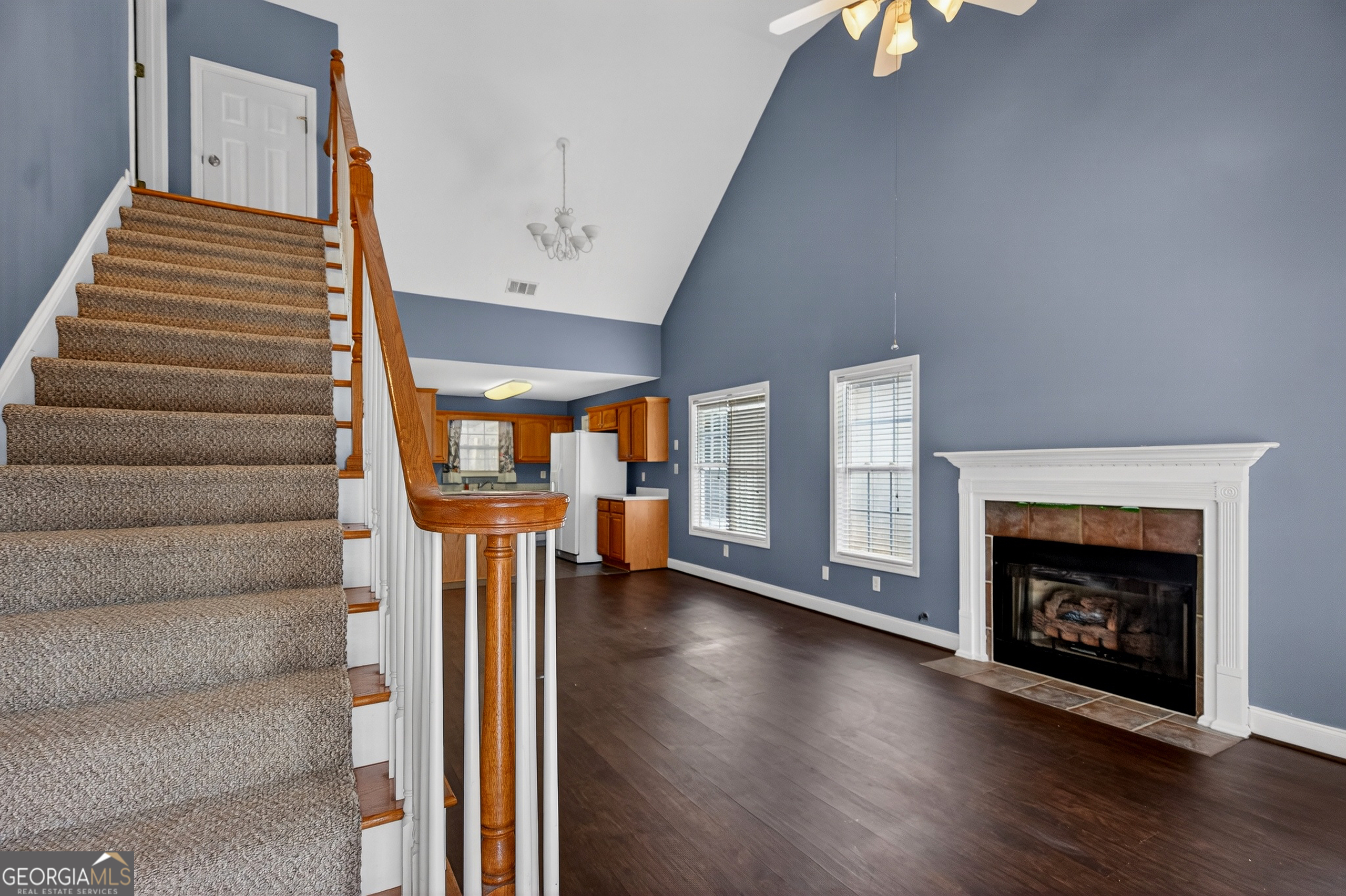 107 Waters Edge Drive LaGrange, GA 30240 - Photo 7 of 29 a view of an entryway with wooden floor fireplace and a window